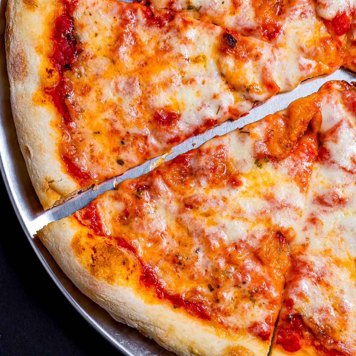 What Is New York Style Pizza: Understanding the Characteristics of NY-Style Pizza